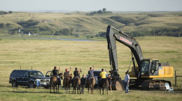  Native people blocking construction of an oil pipeline across Sioux sacred lands